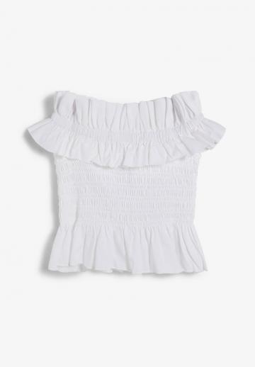 Блузка без рукавов