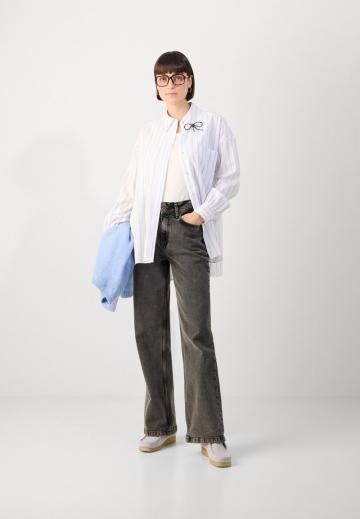 Длинная блузка