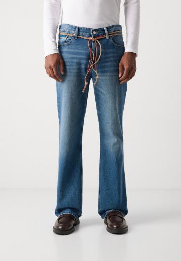 Клешеные джинсы