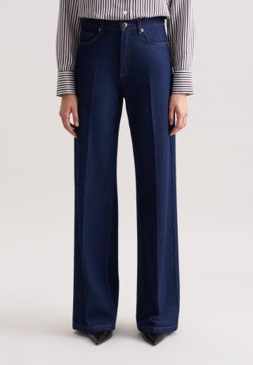 Клешеные джинсы