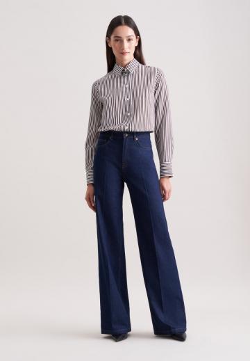 Клешеные джинсы