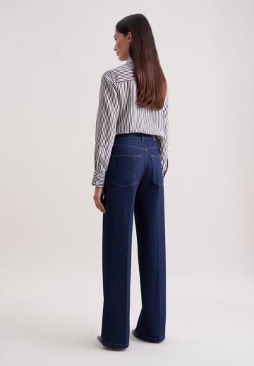 Клешеные джинсы