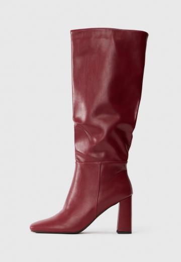 Высокие сапоги