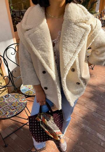 Пуховой жилет