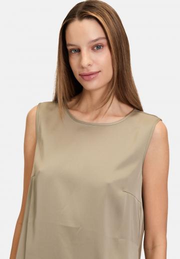 Блузка без рукавов