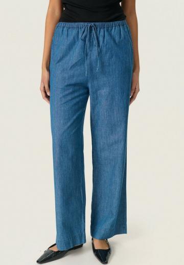 Клешеные джинсы