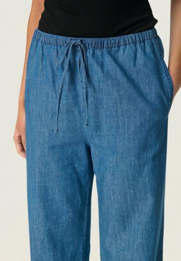 Клешеные джинсы