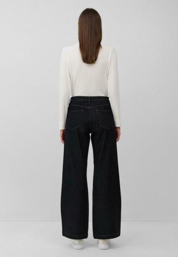 Клешеные джинсы