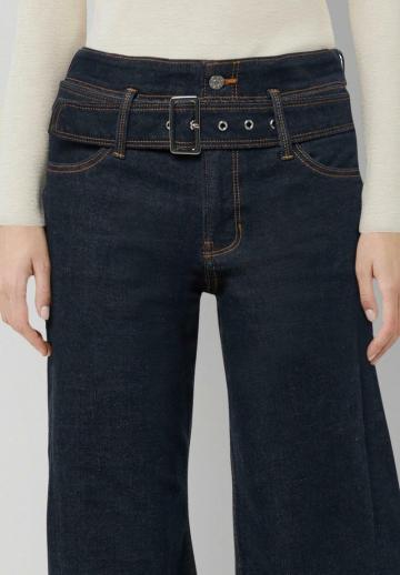 Клешеные джинсы