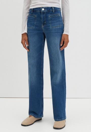 Клешеные джинсы