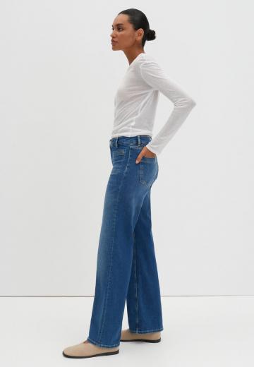 Клешеные джинсы