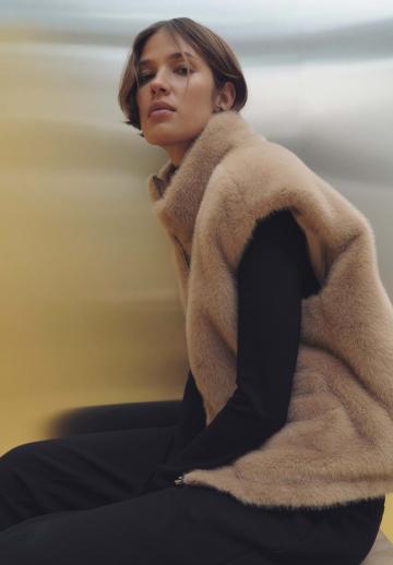 Пуховой жилет