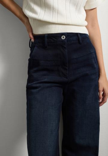 Клешеные джинсы