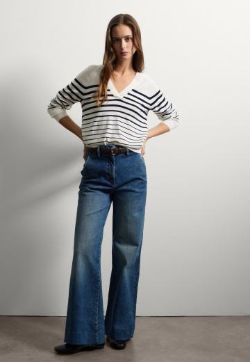 Клешеные джинсы