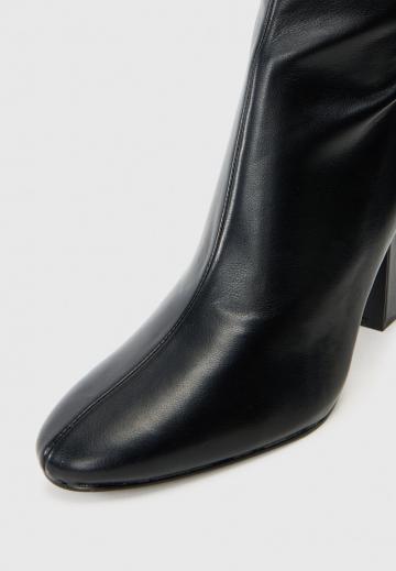 Высокие сапоги