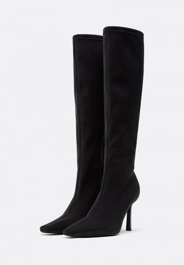 Высокие сапоги