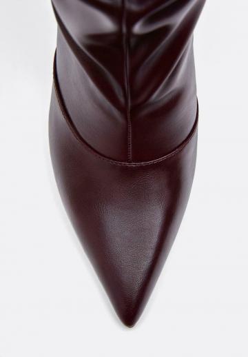 Высокие сапоги