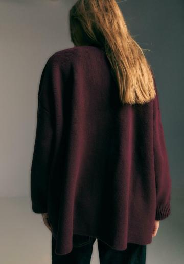 Длинный жилет