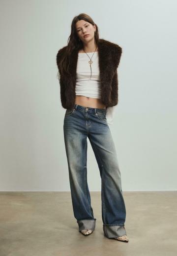 Пуховой жилет