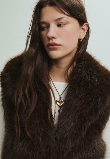 Пуховой жилет