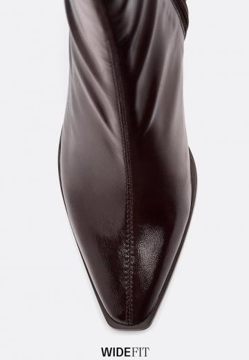 Высокие сапоги