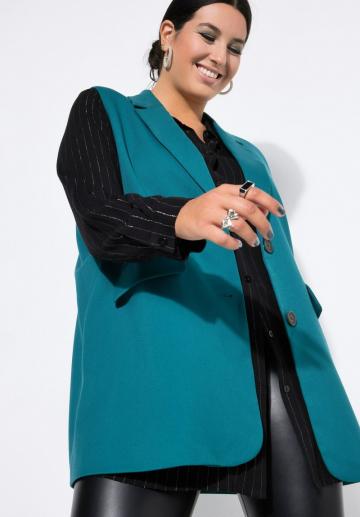 Длинный жилет