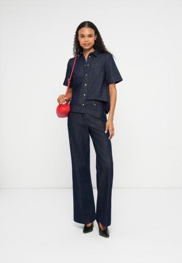 Клешеные джинсы