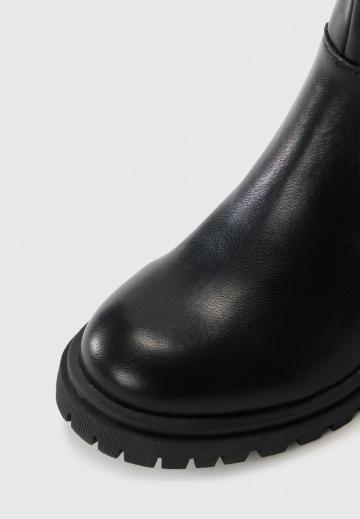 Высокие сапоги