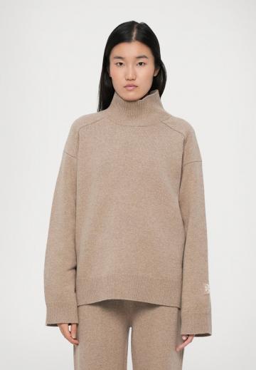 Длинный пуловер