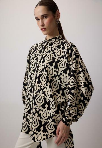 Длинная блузка