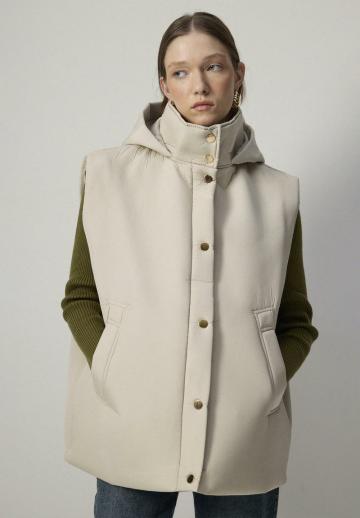 Длинный жилет