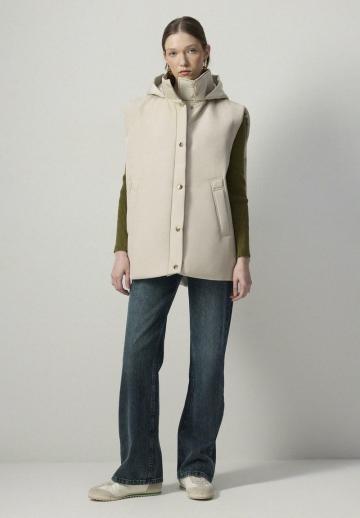 Длинный жилет