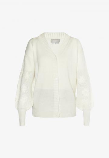 Длинный жилет