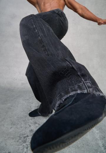 Клешеные джинсы