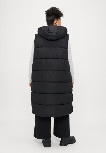 Длинный жилет