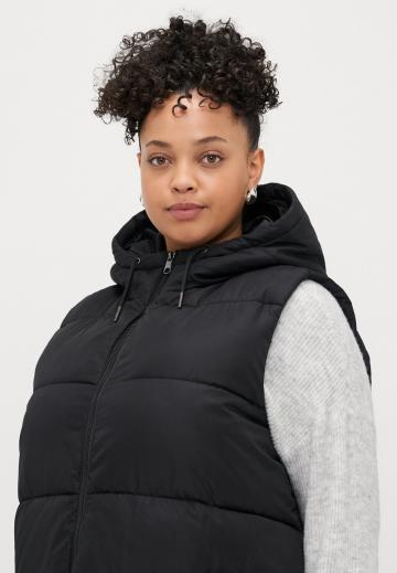 Длинный жилет