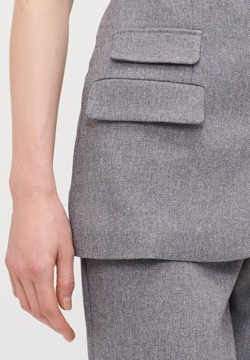 Длинный жилет