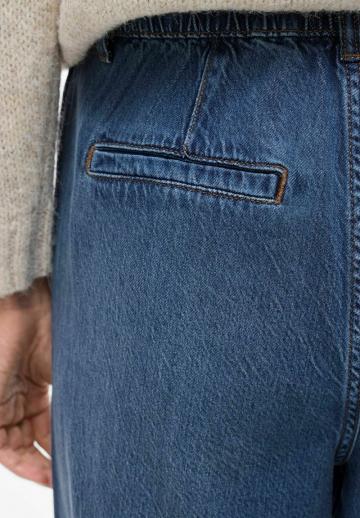 Клешеные джинсы