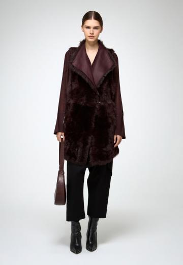 Длинный жилет