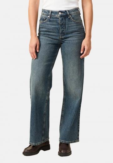 Клешеные джинсы