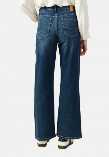 Клешеные джинсы