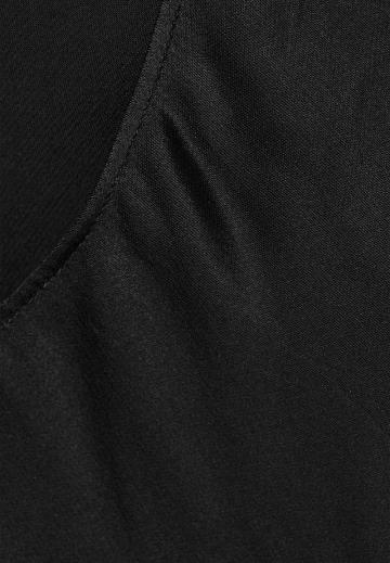 Блузка без рукавов