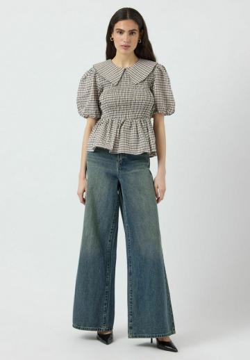 Клешеные джинсы