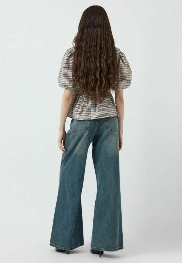 Клешеные джинсы