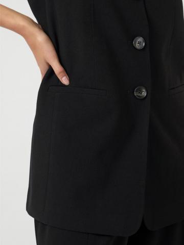 Длинный жилет