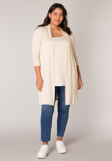 Длинный жилет