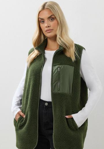 Длинный жилет