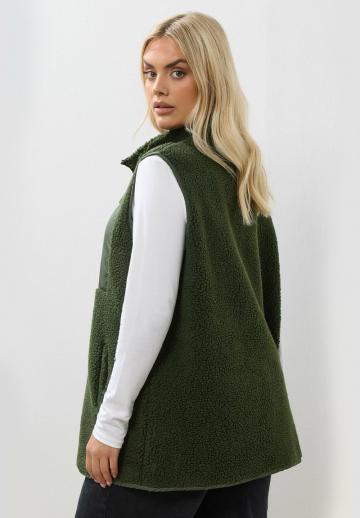 Длинный жилет