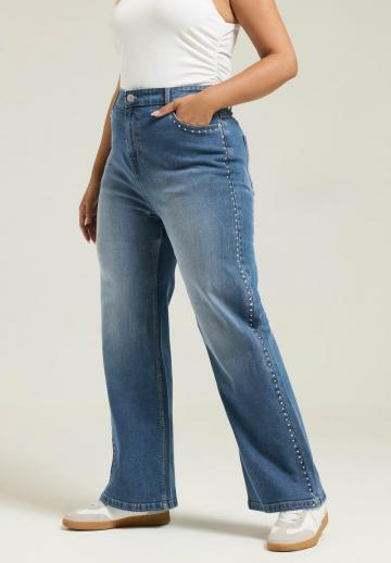 Клешеные джинсы