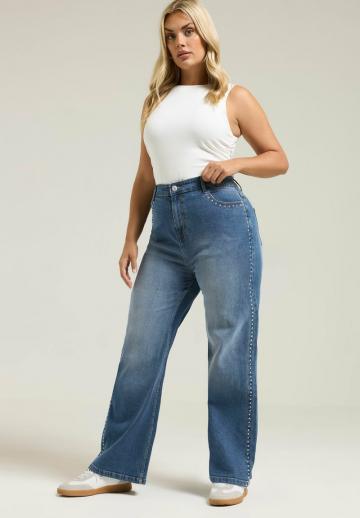 Клешеные джинсы